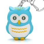 Uggla nyckelring med lysande ögon