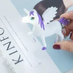 Lysande enhörning nyckelring