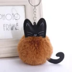 Katt nyckelring med tofs